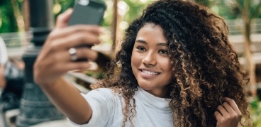 Young woman taking a selfie