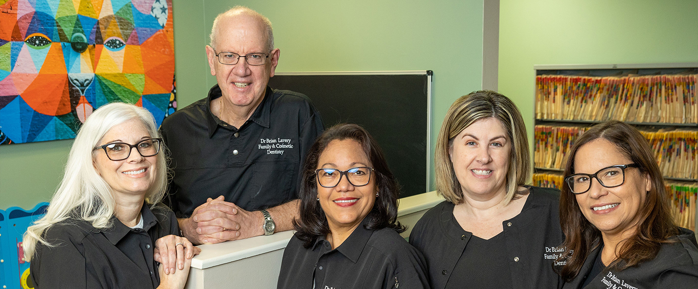 Smiling Mercerville dentist and team at Doctor Brian Lavery Family and Cosmetic Dentistry