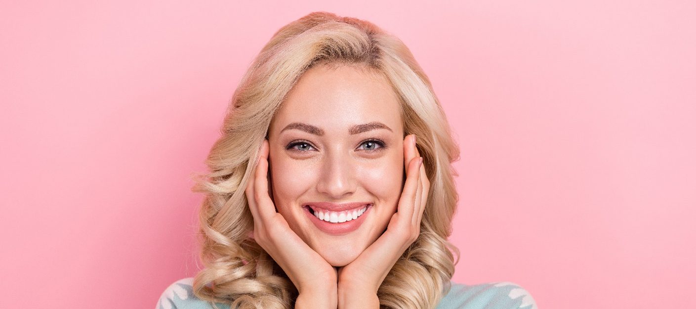 a patient showing off her smile